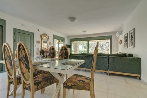 Villa | Living area | 32-inch Smart TV with satellite channels, TV