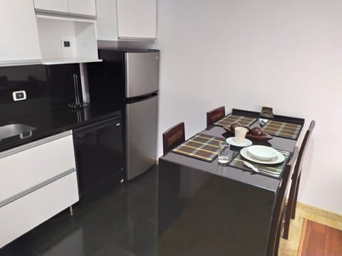 Apartment, 1 Bedroom | Private kitchenette | Fridge, microwave, stovetop, coffee/tea maker