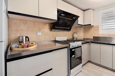 Family Apartment | Private kitchen | Mini-fridge, microwave, espresso maker, coffee/tea maker