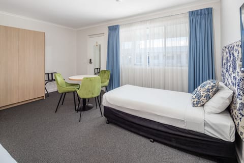 Twin Room | Premium bedding, blackout drapes, iron/ironing board, free WiFi