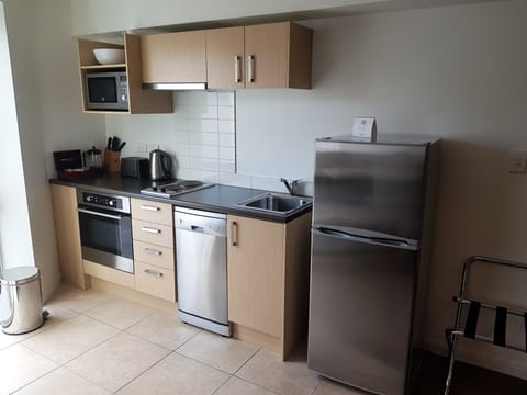 Apartment, 2 Bedrooms | Private kitchen | Full-size fridge, microwave, oven, stovetop