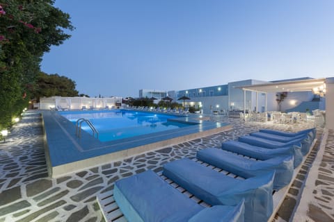 Outdoor pool, open 11:00 AM to 7:00 PM, pool umbrellas, sun loungers