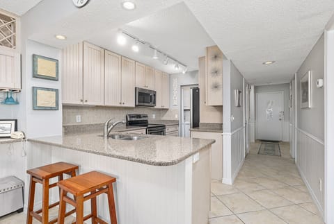 Condo, Multiple Beds, Hot Tub, Ocean View (#2310 - No Pets Allowed) | Private kitchen | Fridge, microwave, oven, stovetop