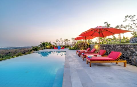 Outdoor pool, pool umbrellas, sun loungers