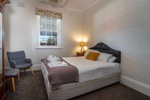 Basic Double Room, 1 Queen Bed | Individually furnished, iron/ironing board, free WiFi, bed sheets