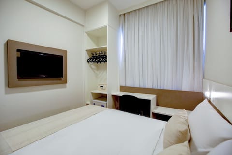 Standard Double Room | Minibar, desk, laptop workspace, iron/ironing board