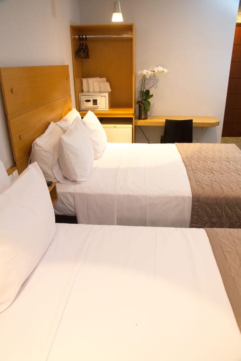 Deluxe Quadruple Room | Minibar, in-room safe, free WiFi, bed sheets