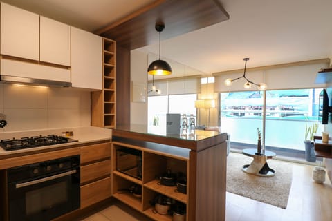 Comfort Apartment | Private kitchen | Fridge, microwave, stovetop, blender