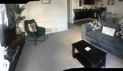 Apartment | Living area | 30-inch TV with digital channels