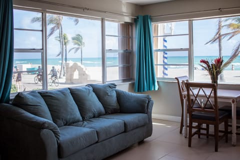 Double Room, Ocean View | Living area | Flat-screen TV