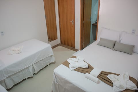 Standard Triple Room, No Windows | Down comforters, pillowtop beds, minibar, free WiFi