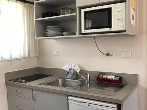 One Bedroom Unit | Private kitchenette | Microwave, electric kettle, toaster