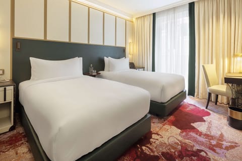 Deluxe Room, 2 Twin Beds | Minibar, in-room safe, blackout drapes, iron/ironing board