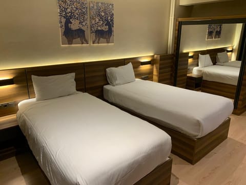 Twin Room | Premium bedding, free WiFi, bed sheets