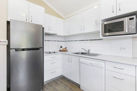 Standard Cabin - Sleeps 4 | Private kitchen | Full-size fridge, microwave, stovetop, dishwasher