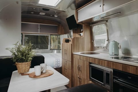 Jayco Airstream - Sleeps 2 - Site 5 | Living area | Flat-screen TV, DVD player