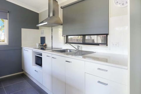 Standard Cabin - Sleeps 4 | Private kitchen | Full-size fridge, microwave, stovetop, electric kettle