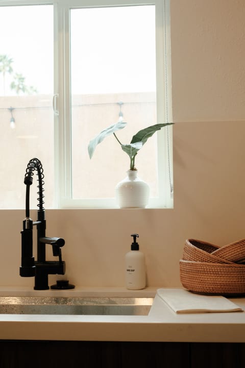 Superior Townhome | Private kitchen | Mini-fridge, coffee/tea maker