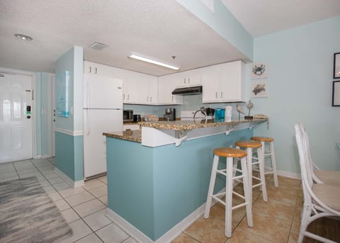 Condo, 2 Bedrooms, Balcony, Beachfront (403) | Private kitchen | Fridge, microwave, oven, stovetop