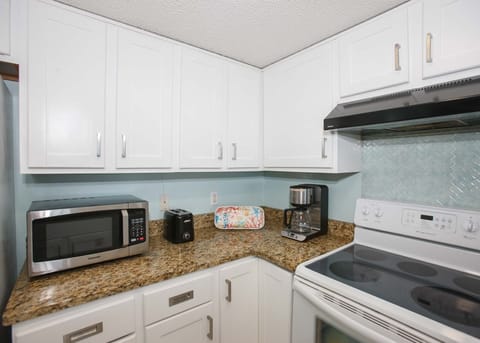 Condo, 2 Bedrooms, Balcony, Beachfront (403) | Private kitchen | Fridge, microwave, oven, stovetop