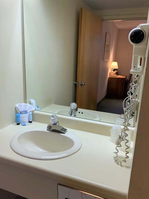 Standard Double Room, 2 Queen Beds | Bathroom | Combined shower/tub, hair dryer, towels