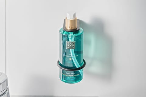 Shower, designer toiletries, towels