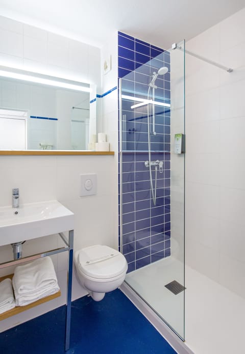 Shower, eco-friendly toiletries, hair dryer, towels