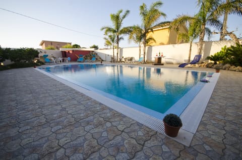 Seasonal outdoor pool, open 7:30 AM to 7:00 PM, sun loungers