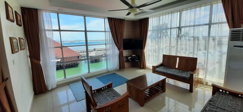 Superior Apartment | Living area | Flat-screen TV