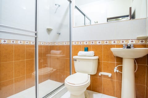 Economy Double Room | Bathroom | Shower, free toiletries, towels, soap