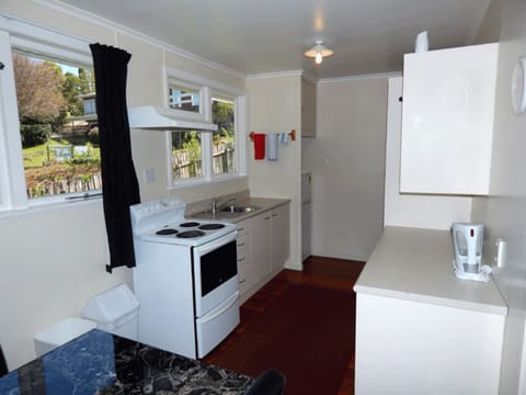 Three Bedroom House | Private kitchen | Fridge, microwave, stovetop, coffee/tea maker