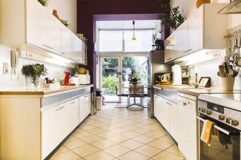 Comfort Apartment | Private kitchen | Full-size fridge, oven, stovetop, dishwasher