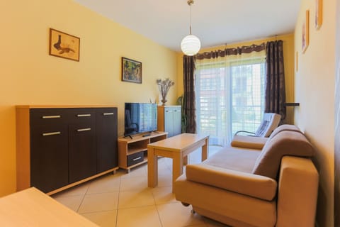 Economy Apartment | Living area | 40-inch flat-screen TV with digital channels, TV