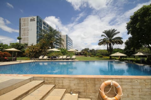 Outdoor pool, pool umbrellas, sun loungers