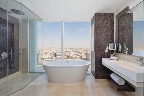 Junior Suite, 1 King Bed, City View | Bathroom | Deep soaking tub, rainfall showerhead, free toiletries, hair dryer