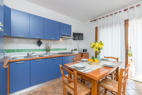 Family Apartment, 2 Bedrooms, 2 Bathrooms (Le Dimore di Nettuno 3 With Pool) | Private kitchen | Fridge, microwave, stovetop, dishwasher