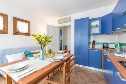 Family Apartment, 2 Bedrooms, 2 Bathrooms (Le Dimore di Nettuno 3 With Pool) | Dining