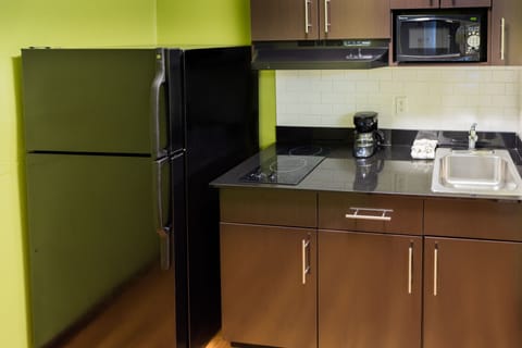 Standard Room, 1 King Bed, Non Smoking, Kitchenette | Private kitchen | Fridge, microwave