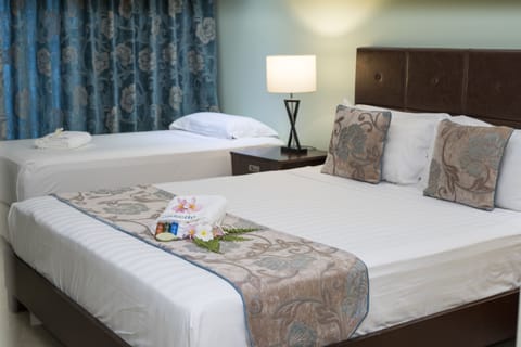 Deluxe Single Room (Plantation View) | Desk, blackout drapes, iron/ironing board, free WiFi