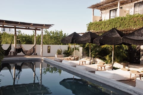 Outdoor pool, pool umbrellas, sun loungers