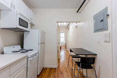 Apartment | Private kitchen | Full-size fridge, microwave, oven, stovetop