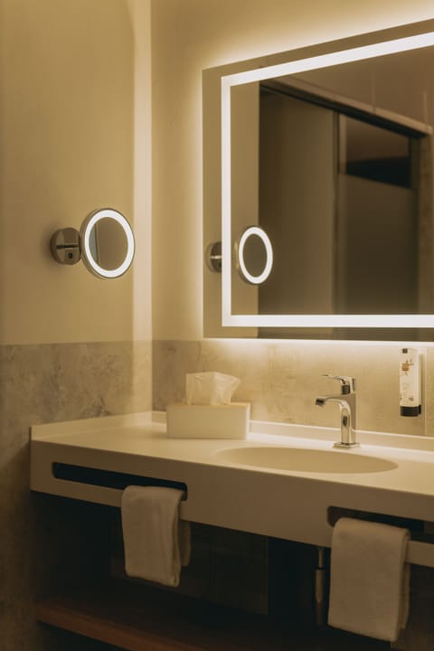 Shower, rainfall showerhead, eco-friendly toiletries, hair dryer