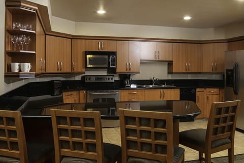 Marquise Suite Strip View | Private kitchen | Fridge, microwave, stovetop, dishwasher