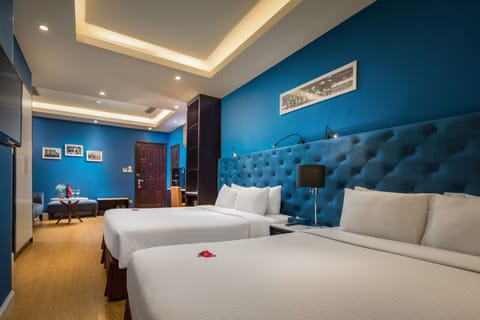 Family Suite, Balcony, City View | Down comforters, minibar, in-room safe, desk