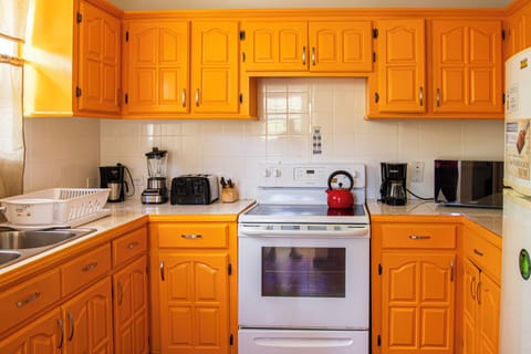 Economy Apartment, 2 Bedrooms | Private kitchen | Full-size fridge, microwave, oven, stovetop