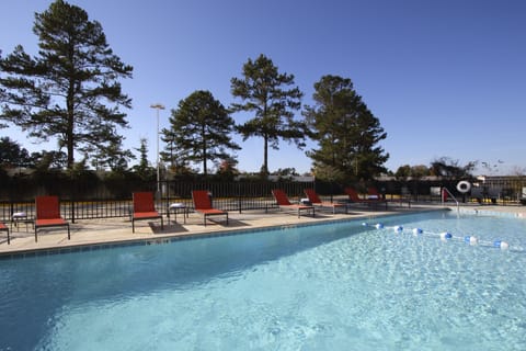 Outdoor pool, open 9:00 AM to 10:00 PM, sun loungers