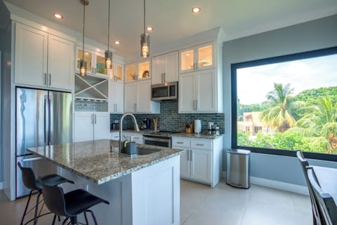 Condo, 2 Bedrooms, Private Pool, Beachfront | Private kitchen | Full-size fridge, microwave, oven, stovetop