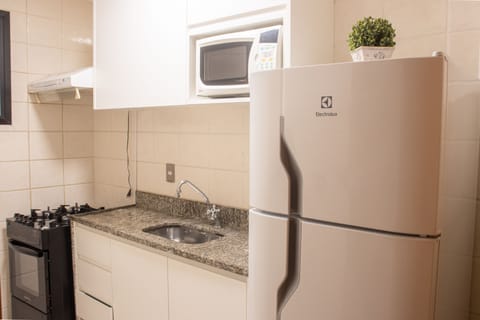 Economy Apartment | Private kitchen | Fridge, microwave, espresso maker, cookware/dishes/utensils