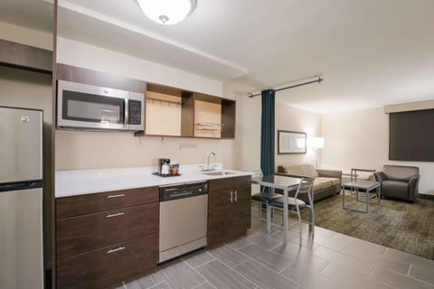 Suite, Multiple Beds, Non Smoking, Kitchenette (with Sofabed) | In-room safe, desk, laptop workspace, iron/ironing board