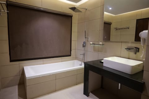 Classic Suite, 1 Bedroom, Balcony, Pool View | Bathroom | Shower, rainfall showerhead, hair dryer, bathrobes